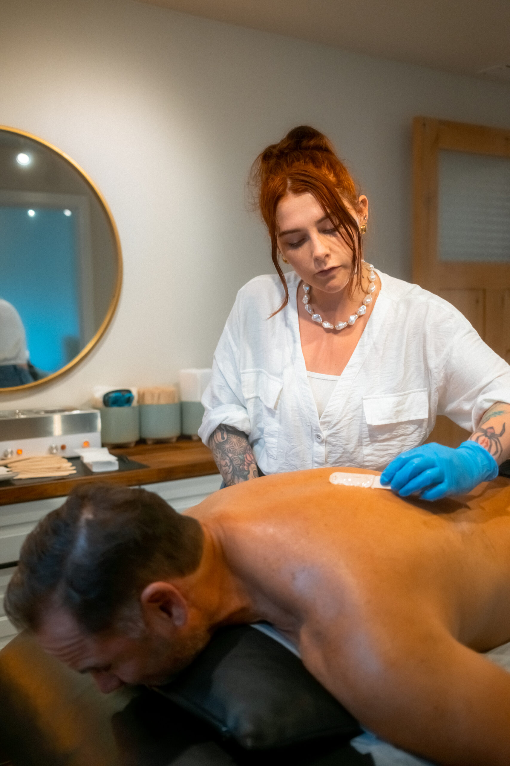 Professional waxing treatment at Wax & Lash Denver using gentle soft wax and luxury hot towel service.