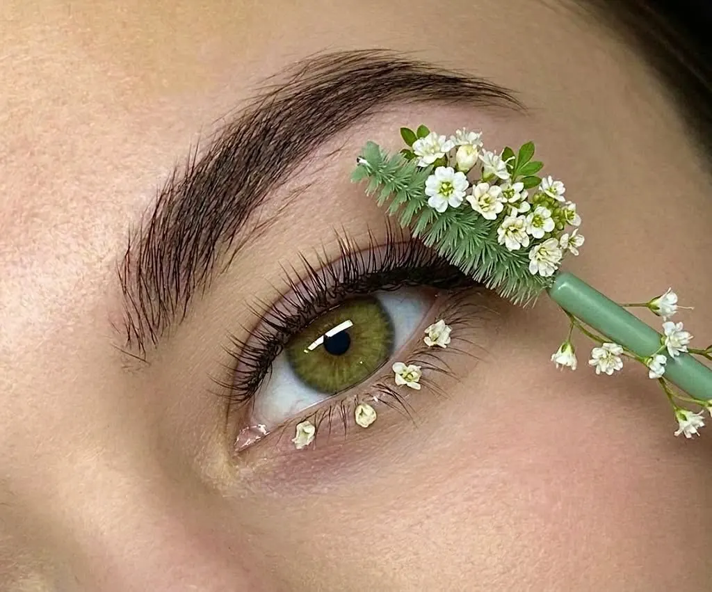 Lash lift for short lashes at Wax & Lash in Denver, a close up of lifted lashes and a groomed brow